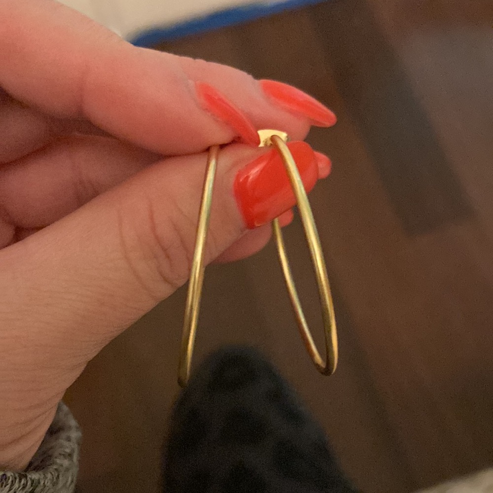Women’s gold hoop earrings